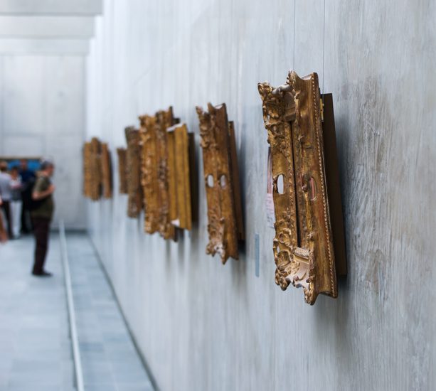Art gallery in Paris, with visitor out of focus.